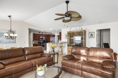Beautiful CBC home backing to canal.  Magnificent landscaping on Spanish Lakes I in Florida - for sale on GolfHomes.com, golf home, golf lot