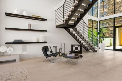Perched in prestigious MacDonald Highlands, this luxury on Dragon Ridge Country Club in Nevada - for sale on GolfHomes.com, golf home, golf lot