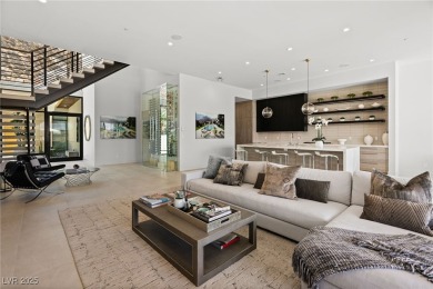 Perched in prestigious MacDonald Highlands, this luxury on Dragon Ridge Country Club in Nevada - for sale on GolfHomes.com, golf home, golf lot