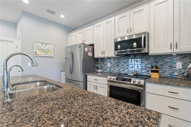 CUSTOM BSI WATERFRONT HOME **COMPLETED IN 2022** W/105FT OF on Twin Isles Country Club in Florida - for sale on GolfHomes.com, golf home, golf lot