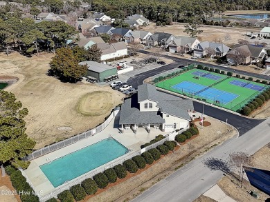 Enjoy the perfect combination of location and lifestyle in this on South Harbour Golf Links in North Carolina - for sale on GolfHomes.com, golf home, golf lot