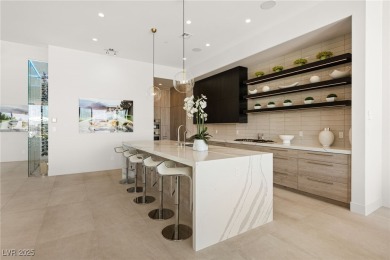 Perched in prestigious MacDonald Highlands, this luxury on Dragon Ridge Country Club in Nevada - for sale on GolfHomes.com, golf home, golf lot
