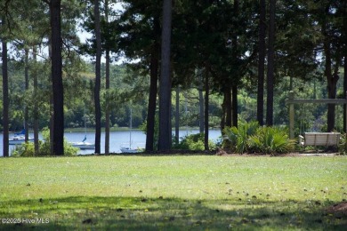 Enjoy the perfect combination of location and lifestyle in this on South Harbour Golf Links in North Carolina - for sale on GolfHomes.com, golf home, golf lot