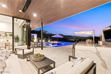 Perched in prestigious MacDonald Highlands, this luxury on Dragon Ridge Country Club in Nevada - for sale on GolfHomes.com, golf home, golf lot