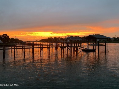 Enjoy the perfect combination of location and lifestyle in this on South Harbour Golf Links in North Carolina - for sale on GolfHomes.com, golf home, golf lot