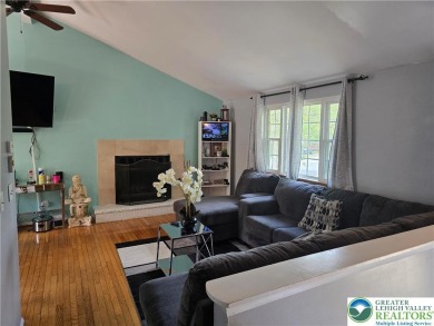 This 4 bedroom, 2 bath split level home sits in an amenity on Pocono Farms Country Club in Pennsylvania - for sale on GolfHomes.com, golf home, golf lot