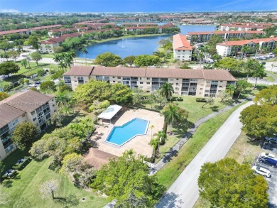 LARGE CORNER UNIT WITH GOLF COURSE VIEW FOR SALE! 2 bedroom, 2 on Flamingo Lakes Country Club in Florida - for sale on GolfHomes.com, golf home, golf lot