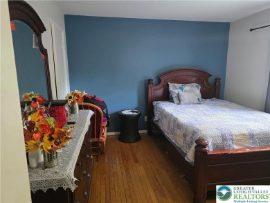 This 4 bedroom, 2 bath split level home sits in an amenity on Pocono Farms Country Club in Pennsylvania - for sale on GolfHomes.com, golf home, golf lot