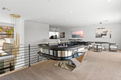 Perched high above the Las Vegas valley in guard-gated MacDonald on Dragon Ridge Country Club in Nevada - for sale on GolfHomes.com, golf home, golf lot