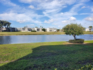 Amazing 2/2 deluxe corner condo with direct lake and golf course on Kings Point Golf -Flanders Way in Florida - for sale on GolfHomes.com, golf home, golf lot