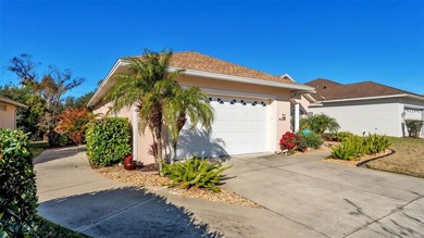 Spend your days under swaying palm trees as you chip, putt and on Huntington Hills Golf and Country Club in Florida - for sale on GolfHomes.com, golf home, golf lot