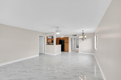 Amazing 2/2 deluxe corner condo with direct lake and golf course on Kings Point Golf -Flanders Way in Florida - for sale on GolfHomes.com, golf home, golf lot