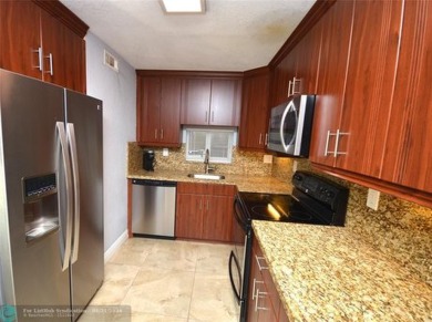 WOW!! Walk into modern elegance in this 2 bedroom 2 bath, with on Hollybrook Golf and Tennis Club  in Florida - for sale on GolfHomes.com, golf home, golf lot