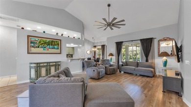 Spend your days under swaying palm trees as you chip, putt and on Huntington Hills Golf and Country Club in Florida - for sale on GolfHomes.com, golf home, golf lot