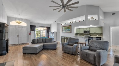 Spend your days under swaying palm trees as you chip, putt and on Huntington Hills Golf and Country Club in Florida - for sale on GolfHomes.com, golf home, golf lot