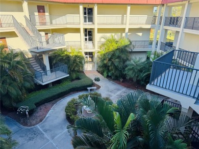 Mediterranean Manors, located at Dunedin is a water front on The Dunedin Country Club in Florida - for sale on GolfHomes.com, golf home, golf lot
