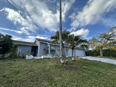 This stunning modern home has lots of upgrades. It's a true on Ocean Breeze Golf and Country Club in Florida - for sale on GolfHomes.com, golf home, golf lot