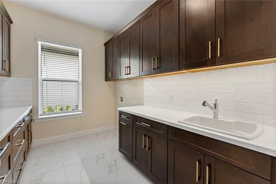 Welcome to a newly constructed Beacon model in Esplanade by the on The Golf Club At Fiddlers Creek in Florida - for sale on GolfHomes.com, golf home, golf lot