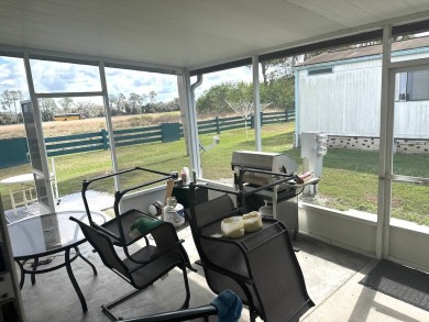 COME LOOK AT THIS UPDATED 2-BEDROOM, 1.5-BATHROOM HOME IN on Anglers Green Golf Course in Florida - for sale on GolfHomes.com, golf home, golf lot