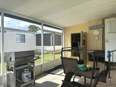 COME LOOK AT THIS UPDATED 2-BEDROOM, 1.5-BATHROOM HOME IN on Anglers Green Golf Course in Florida - for sale on GolfHomes.com, golf home, golf lot