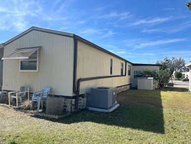 COME LOOK AT THIS UPDATED 2-BEDROOM, 1.5-BATHROOM HOME IN on Anglers Green Golf Course in Florida - for sale on GolfHomes.com, golf home, golf lot