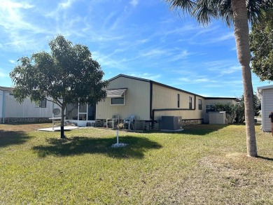 COME LOOK AT THIS UPDATED 2-BEDROOM, 1.5-BATHROOM HOME IN on Anglers Green Golf Course in Florida - for sale on GolfHomes.com, golf home, golf lot