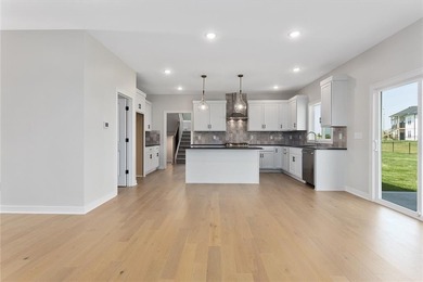 Introducing *Lexington,* an epitome of luxury and functionality on Heritage Park Golf Course in Kansas - for sale on GolfHomes.com, golf home, golf lot