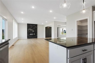 Introducing *Lexington,* an epitome of luxury and functionality on Heritage Park Golf Course in Kansas - for sale on GolfHomes.com, golf home, golf lot