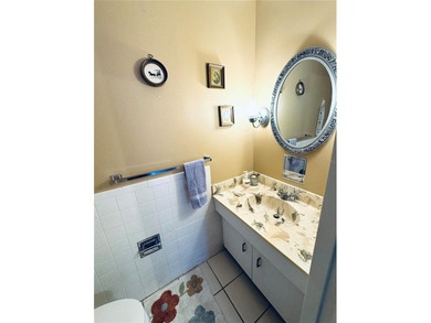 Mediterranean Manors, located at Dunedin is a water front on The Dunedin Country Club in Florida - for sale on GolfHomes.com, golf home, golf lot