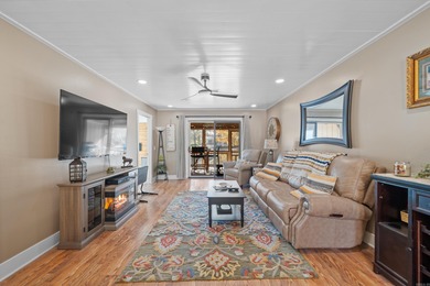 Peaceful waterfront views abound from each room in this updated on DeSoto Golf Course in Arkansas - for sale on GolfHomes.com, golf home, golf lot