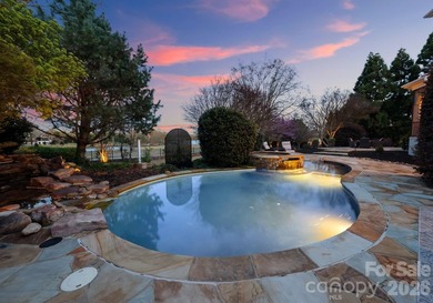 Set along the 14th hole of Trump National Golf Club Charlotte on Trump National Golf Club Charlotte in North Carolina - for sale on GolfHomes.com, golf home, golf lot