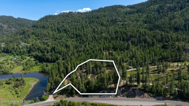 Breathtaking views of the Green Monarchs, Pack River Delta, Lake on The Idaho Club in Idaho - for sale on GolfHomes.com, golf home, golf lot