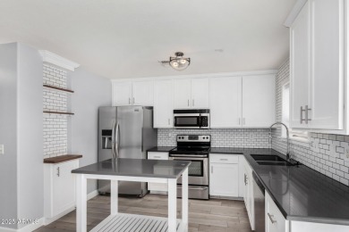 Contemporary two-story home offering 4 bedrooms and 2.5 baths on The Duke At Rancho El Dorado Golf Course in Arizona - for sale on GolfHomes.com, golf home, golf lot