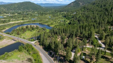 Breathtaking views of the Green Monarchs, Pack River Delta, Lake on The Idaho Club in Idaho - for sale on GolfHomes.com, golf home, golf lot