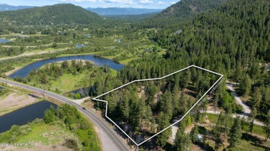 Breathtaking views of the Green Monarchs, Pack River Delta, Lake on The Idaho Club in Idaho - for sale on GolfHomes.com, golf home, golf lot