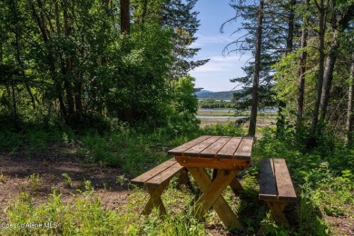 Breathtaking views of the Green Monarchs, Pack River Delta, Lake on The Idaho Club in Idaho - for sale on GolfHomes.com, golf home, golf lot