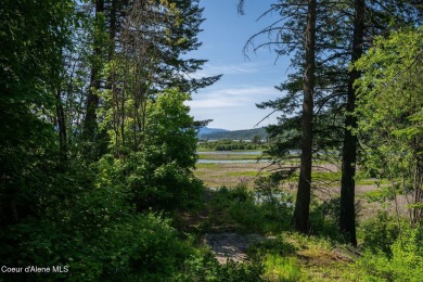Breathtaking views of the Green Monarchs, Pack River Delta, Lake on The Idaho Club in Idaho - for sale on GolfHomes.com, golf home, golf lot