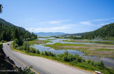 Breathtaking views of the Green Monarchs, Pack River Delta, Lake on The Idaho Club in Idaho - for sale on GolfHomes.com, golf home, golf lot
