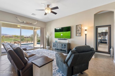 This stunning oasis is located on the 16th hole in Estrella's on Estrella Mountain Ranch Golf Course in Arizona - for sale on GolfHomes.com, golf home, golf lot