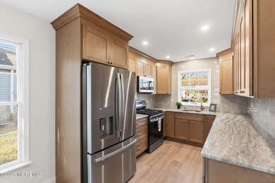 Beautifully remodeled, move-in-ready home located in one of the on Greenbriar Woodlands in New Jersey - for sale on GolfHomes.com, golf home, golf lot