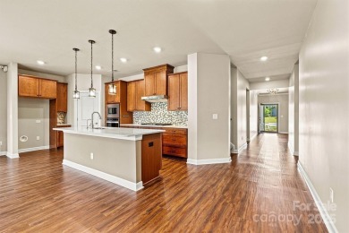 Beautifully maintained 4-bedroom, 3.5-bath detached home nestled on Verdict Ridge Golf and Country Club in North Carolina - for sale on GolfHomes.com, golf home, golf lot