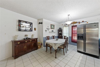 Discover the incredible potential of this spacious 4-bedroom, 2 on Northdale Golf and Tennis Club in Florida - for sale on GolfHomes.com, golf home, golf lot