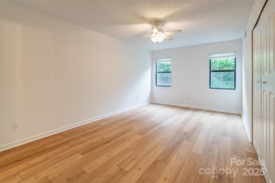 Located just minutes from the Asheville Municipal Golf Course on Asheville Municipal Golf Course in North Carolina - for sale on GolfHomes.com, golf home, golf lot