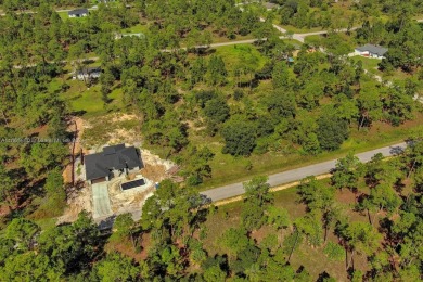 Exclusively listed by Sunland Real Estate: This prime 0.50-acre on Lehigh Resort Club in Florida - for sale on GolfHomes.com, golf home, golf lot