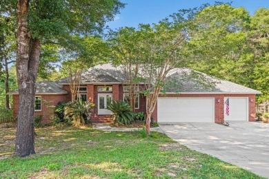 This exquisite property in Rocky Bayou Estates, built by Randy on Rocky Bayou Country Club in Florida - for sale on GolfHomes.com, golf home, golf lot