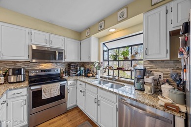 BEAUTIFUL AND SERENE SETTING! WEST WIND TOWNHOME ON LAKE IN on Harbour Point Golf Club in North Carolina - for sale on GolfHomes.com, golf home, golf lot