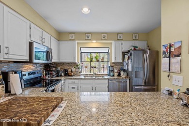 BEAUTIFUL AND SERENE SETTING! WEST WIND TOWNHOME ON LAKE IN on Harbour Point Golf Club in North Carolina - for sale on GolfHomes.com, golf home, golf lot