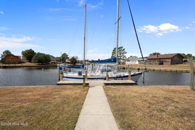 Spectacular water views from nearly every room make this home on Harbour Point Golf Club in North Carolina - for sale on GolfHomes.com, golf home, golf lot