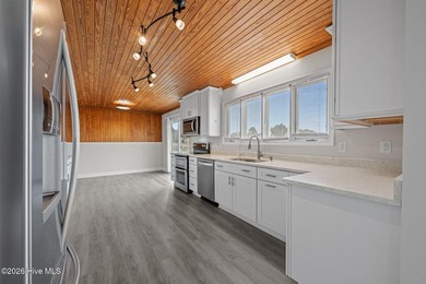 Spectacular water views from nearly every room make this home on Harbour Point Golf Club in North Carolina - for sale on GolfHomes.com, golf home, golf lot