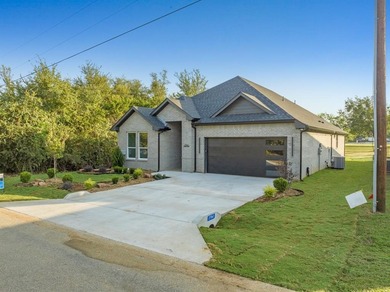 Discover elegance and modern living in this newly constructed on White Bluff Resort - New Course in Texas - for sale on GolfHomes.com, golf home, golf lot